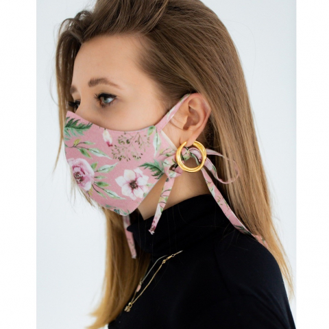 woman wearing pink face mask