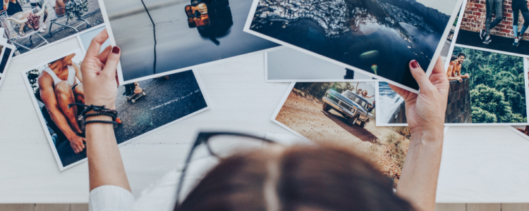 Woman looking at photographs